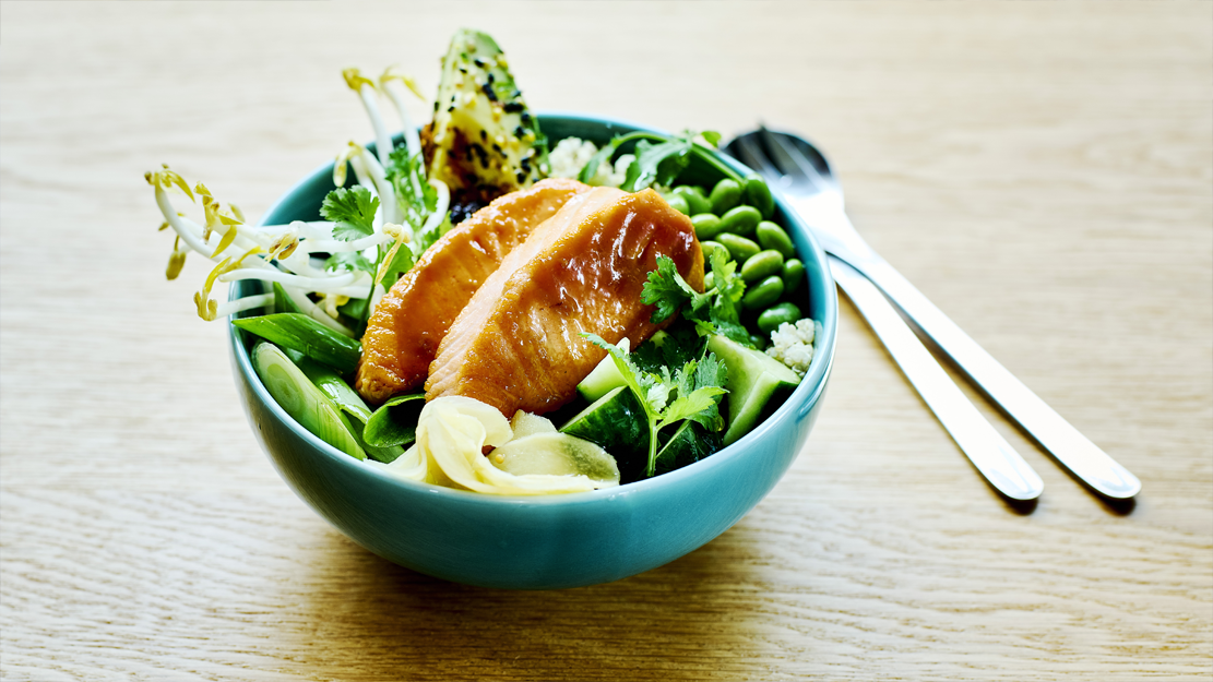Miso glazed ocean trout poke bowl with quinoa and avocado
