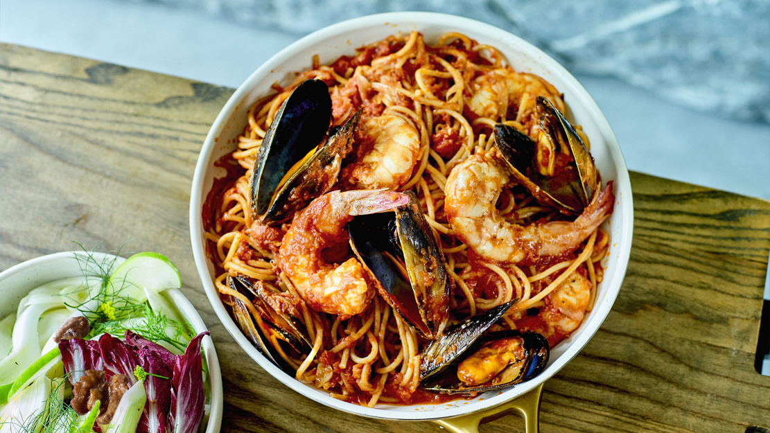 Seafood linguini with fennel and radicchio salad