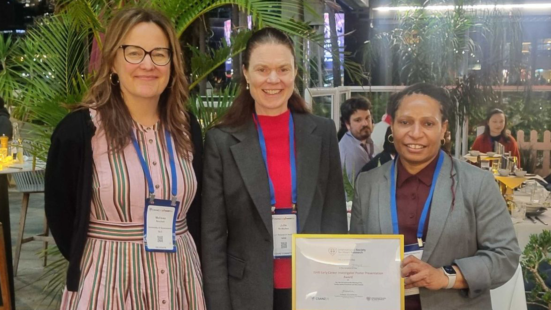 Dr Ruth Magaye receiving the Early Career Investigator Poster Presentation Prize